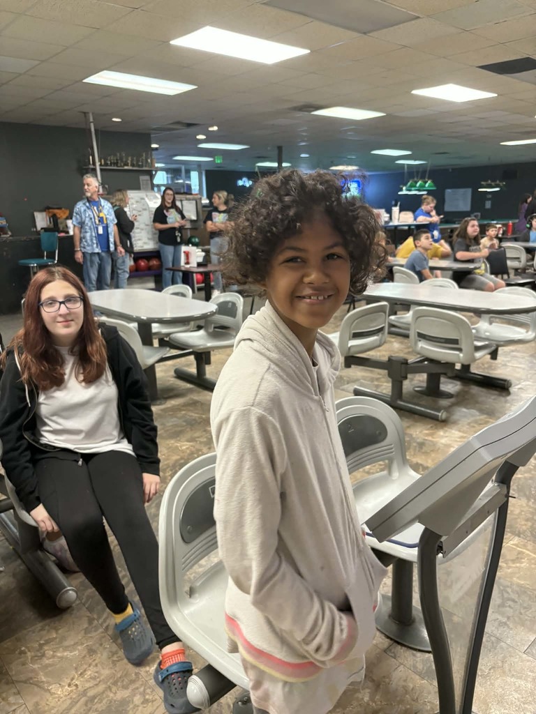 Students smiling on bowling trip