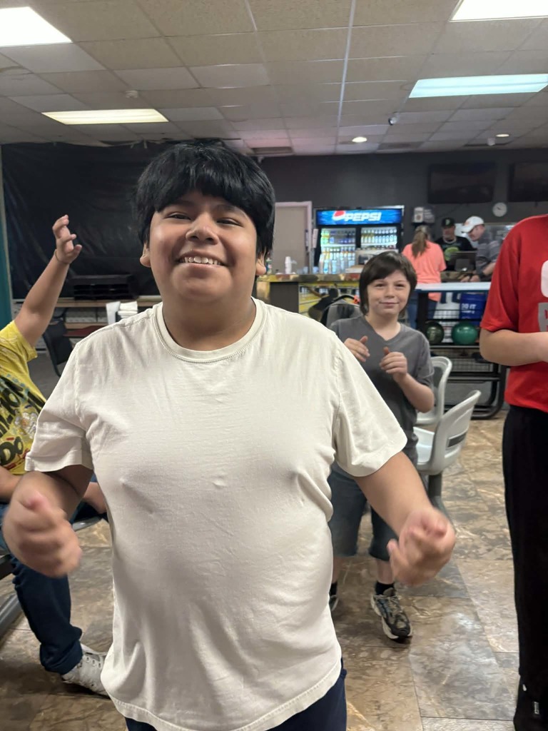 Students smiling on bowling trip