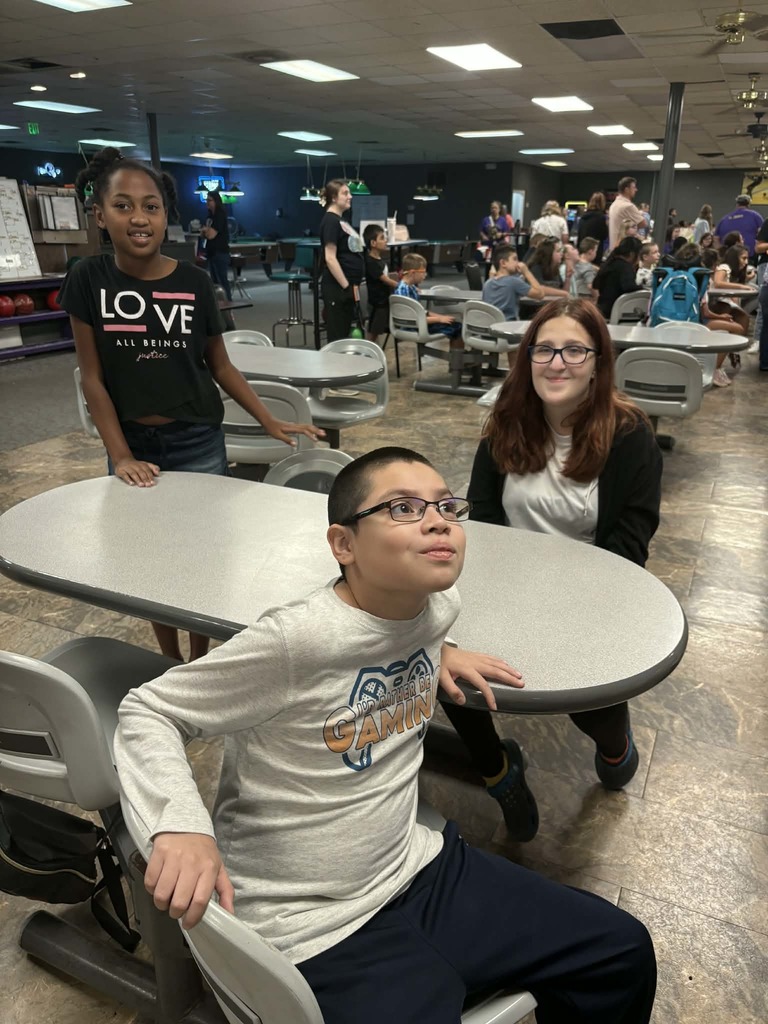 Students smiling on bowling trip