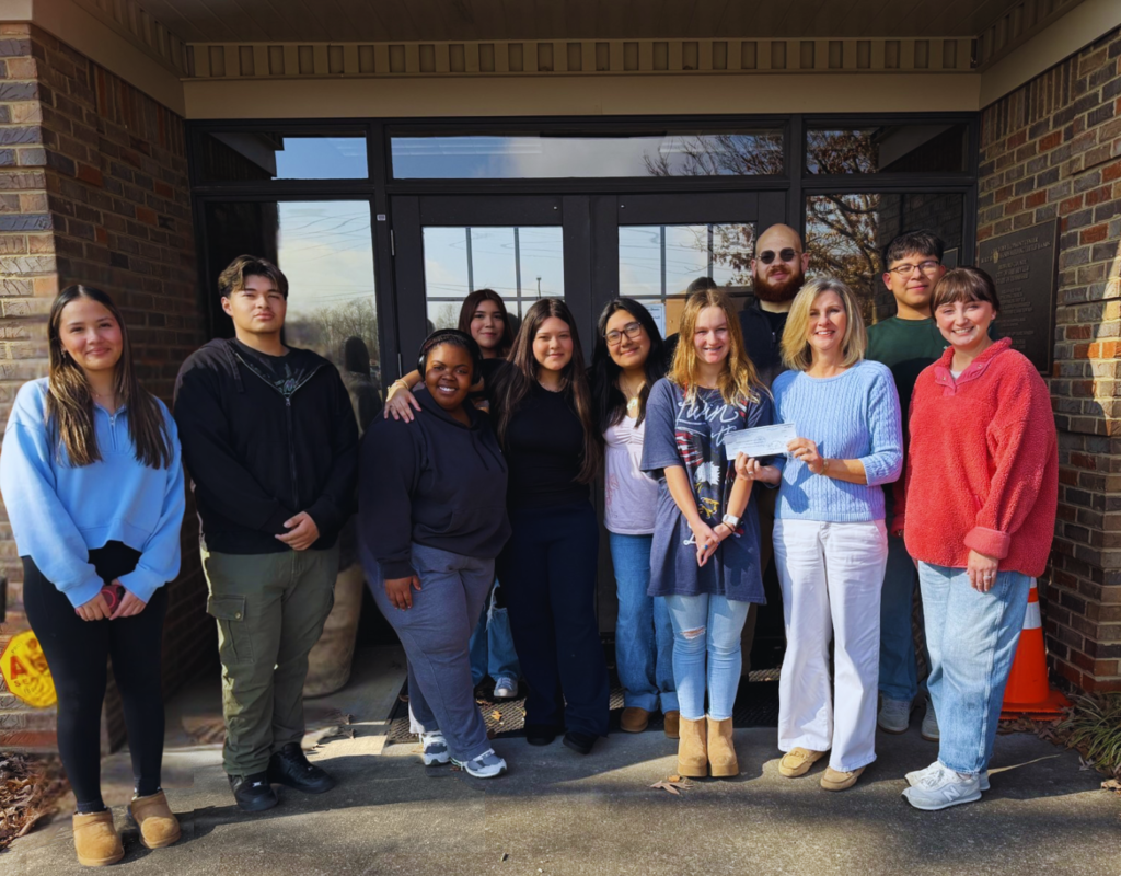 SCHS Renaissance Program Christmas Tree Decorating Contest Check Donation to Childhood Development Center