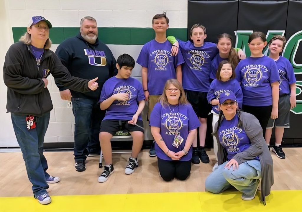 Students from Community Middle School pose for a group picture.