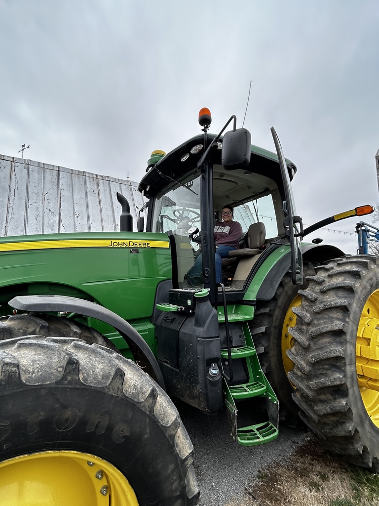 SCHS student on a tractor