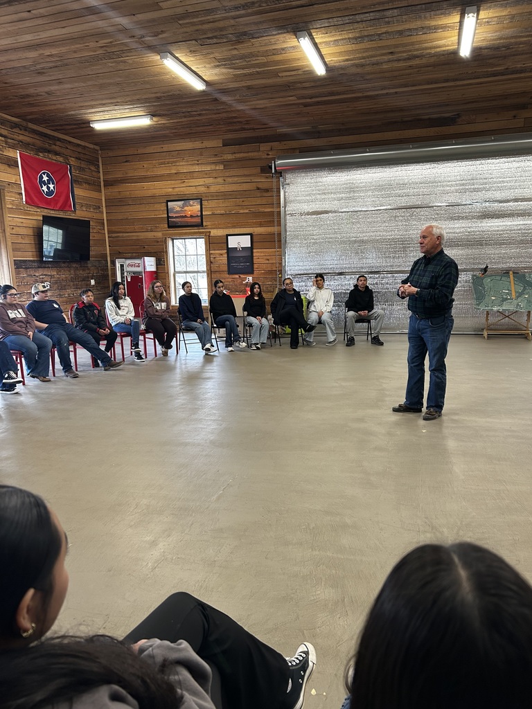 SCHS FFA students are listening to someone speak.