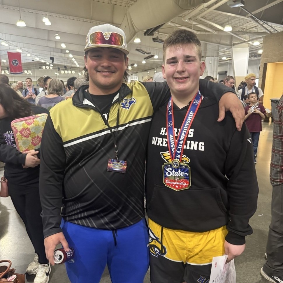 Proud Coach with his Championship Wrestler