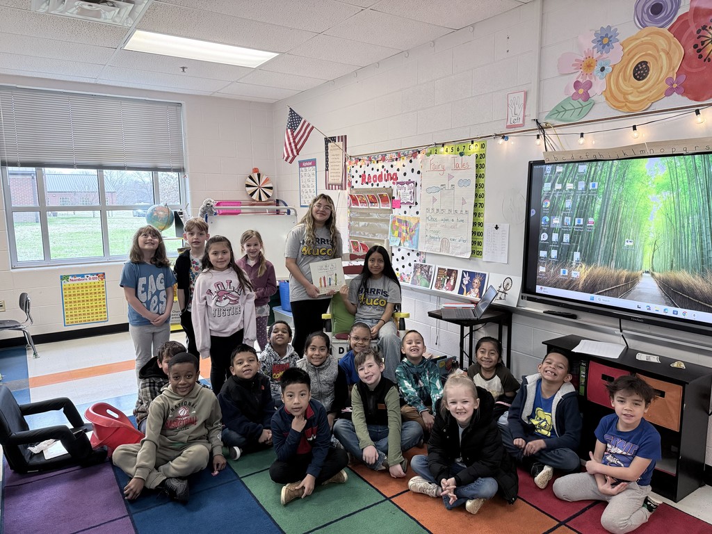 HMS Student Council members reading to students at Learning Way Elementary.