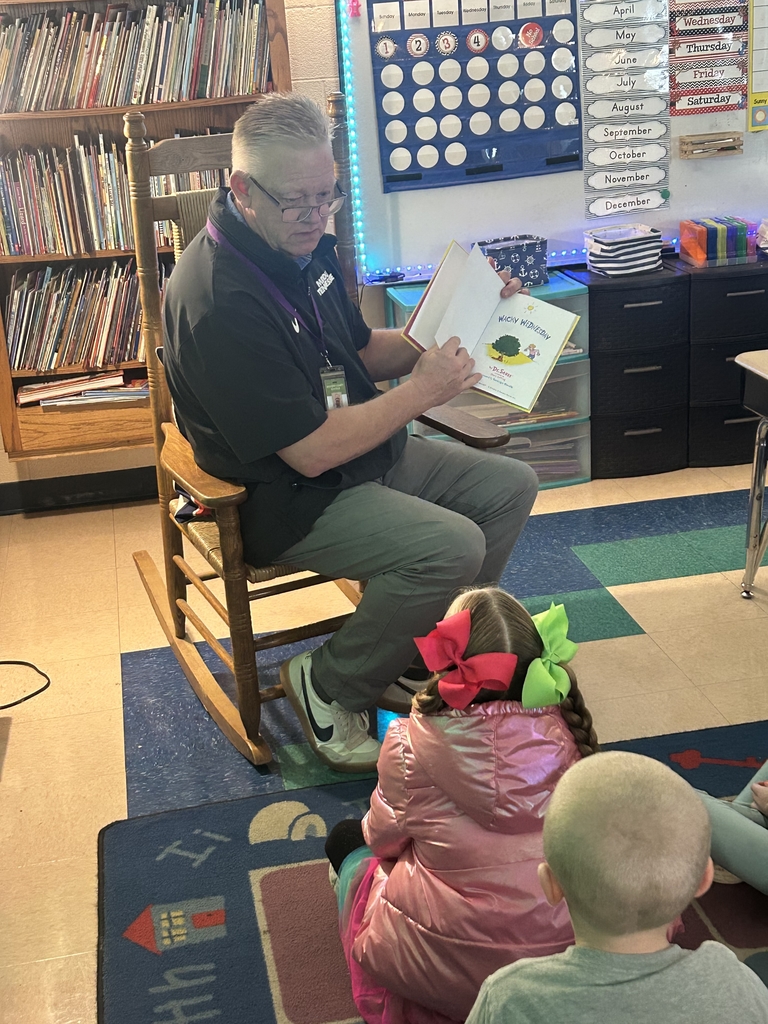 volunteer reader in classroom