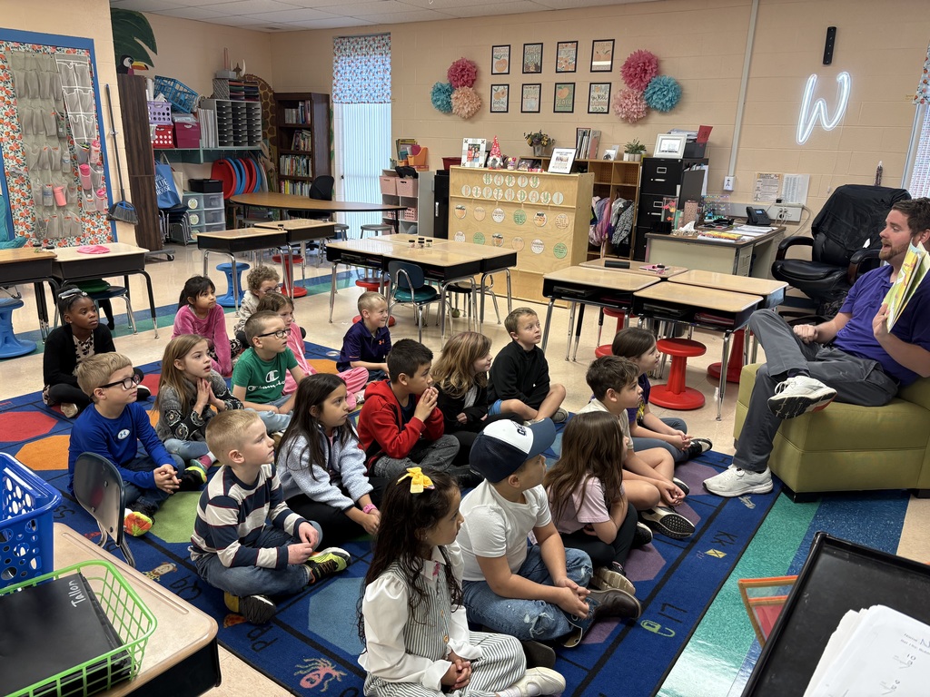 Dr. Boyce reading to a 1st Grade class