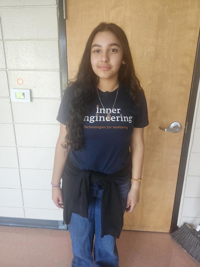 Thomas Magnet School Spelling Bee Champion Poses for a Picture