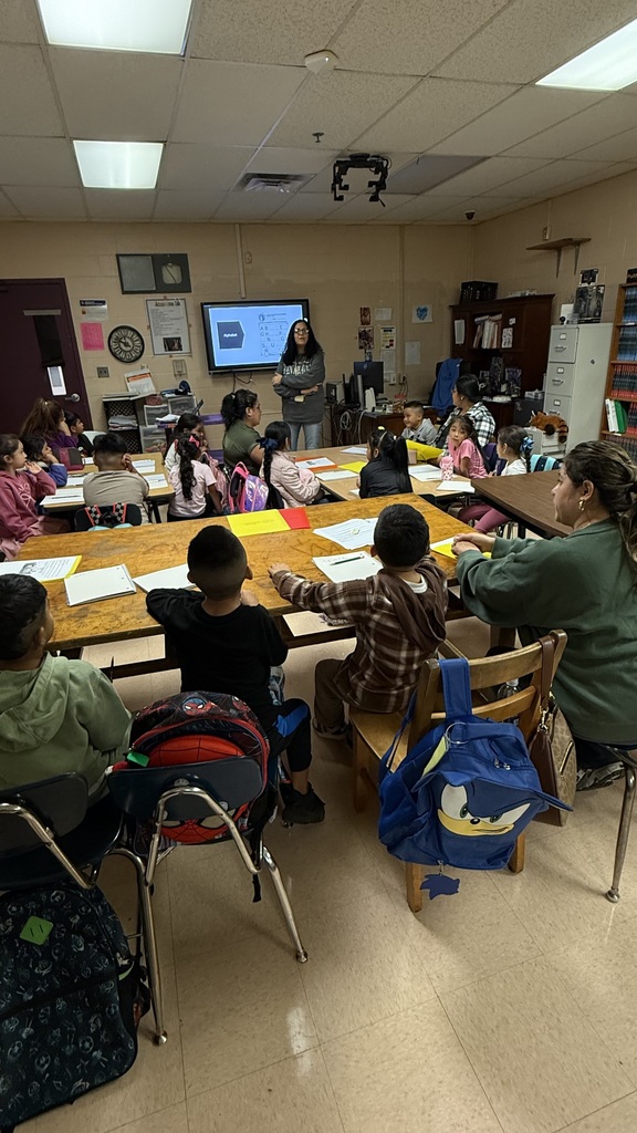 parents and students listening to teacher