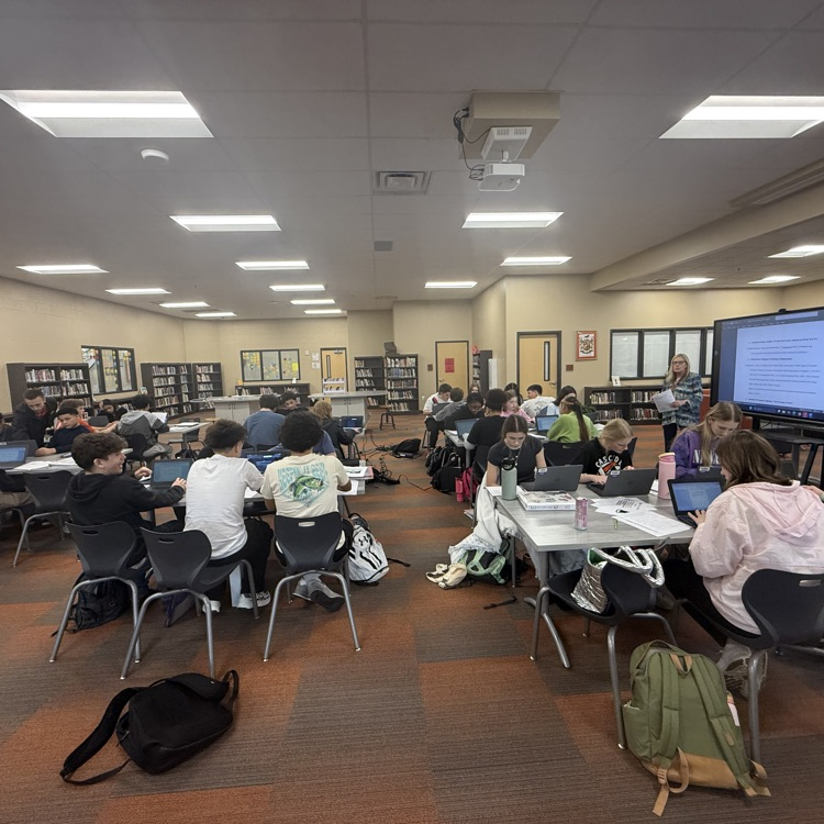 students working on works cited page