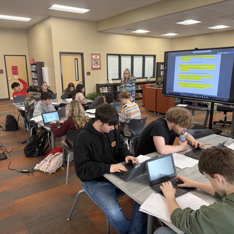 students working on works cited page