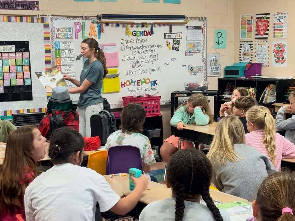 Cascade High School Lady Champions read to students at Cascade Elementary School for Read Across America Week.
