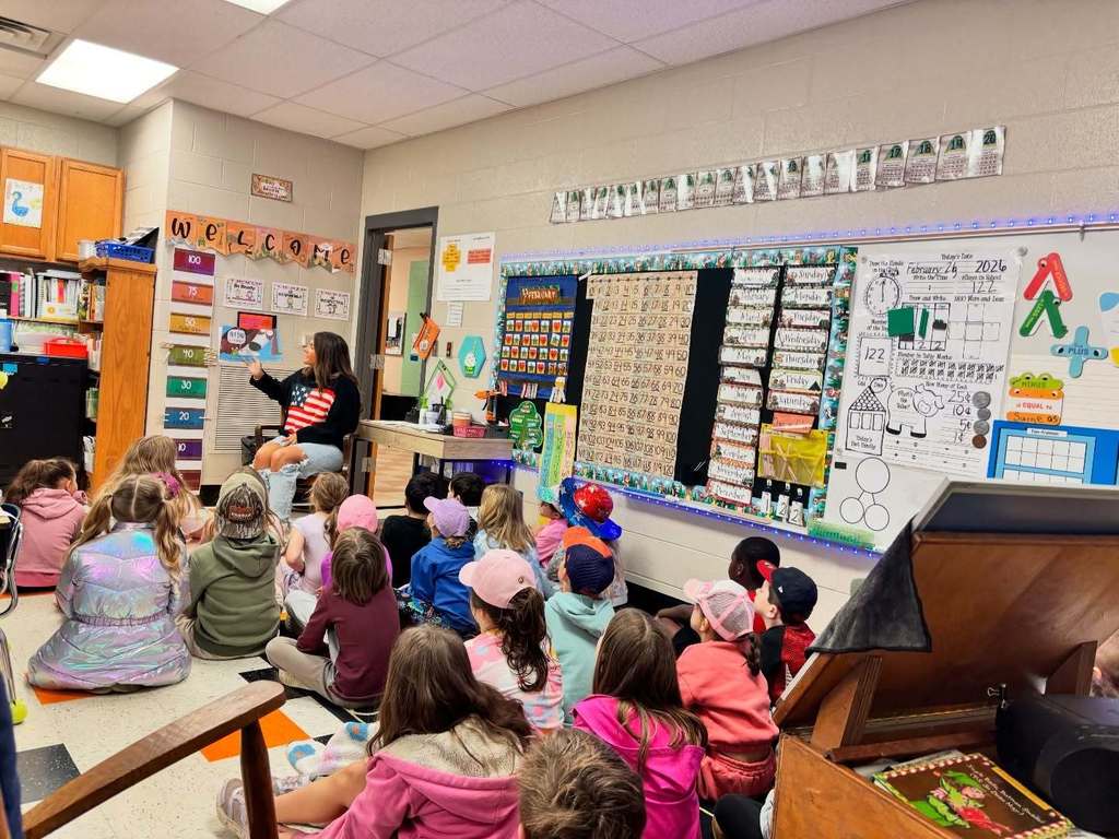 Cascade High School Lady Champions read to students at Cascade Elementary School for Read Across America Week.