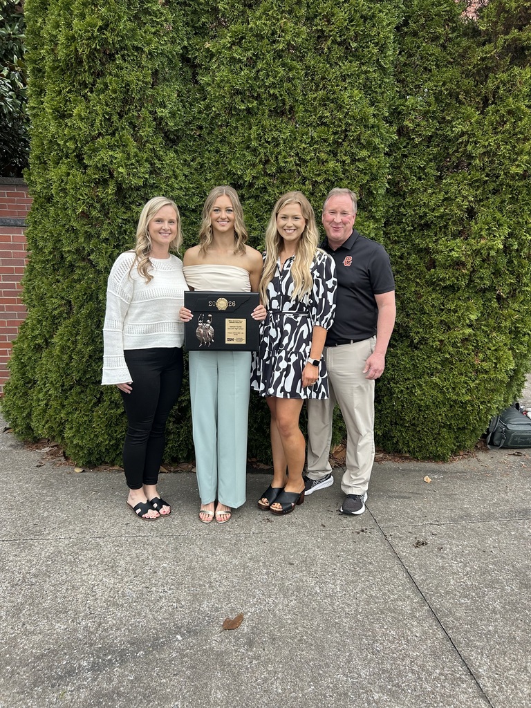 Cascade High School senior Kaegan Young poses for a group photo with head coach Janie Demonbreum, Assistant coaches Kaylee Melson and Kevin Woodson .