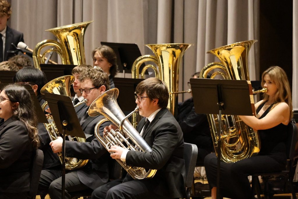 Students are playing their instruments.