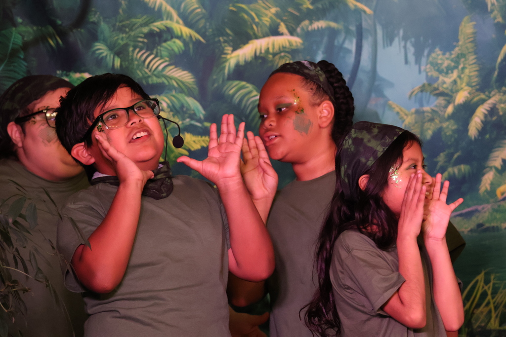 Cast members of Disney's The Jungle Book KIDS – Dual Language Edition play.