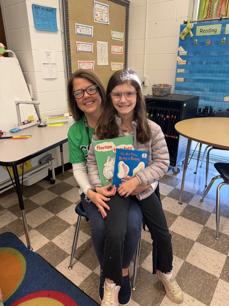 Guest reader and a student.