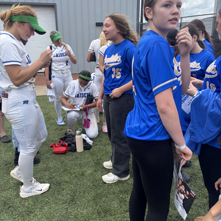 HMS Softball players enjoying the MTSU game.