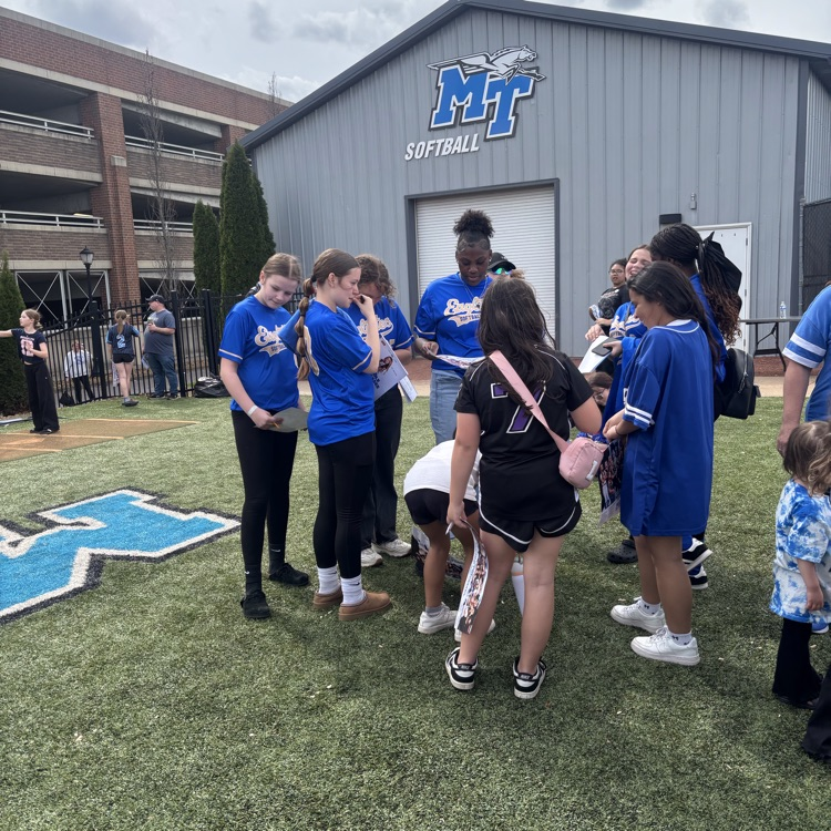 HMS Softball players enjoying the MTSU game.