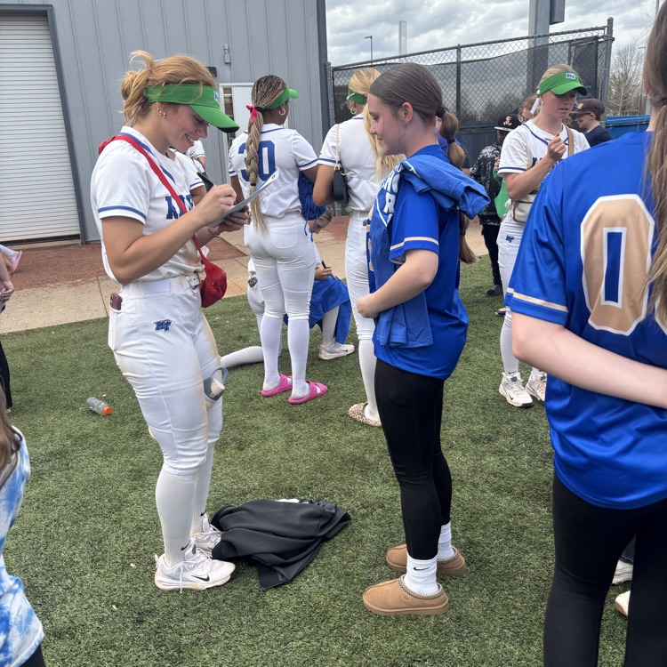 HMS Softball players enjoying the MTSU game