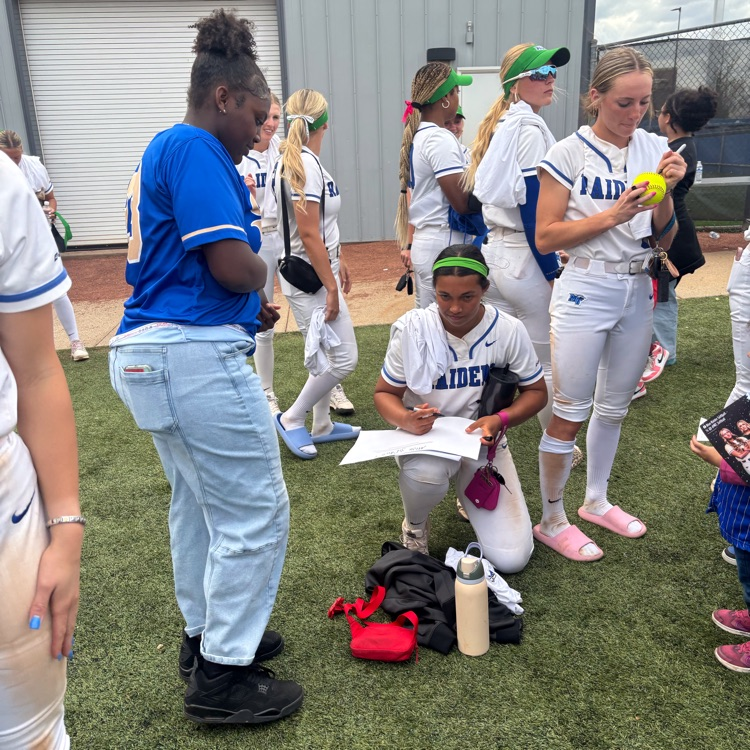 HMS Softball players enjoying the MTSU game