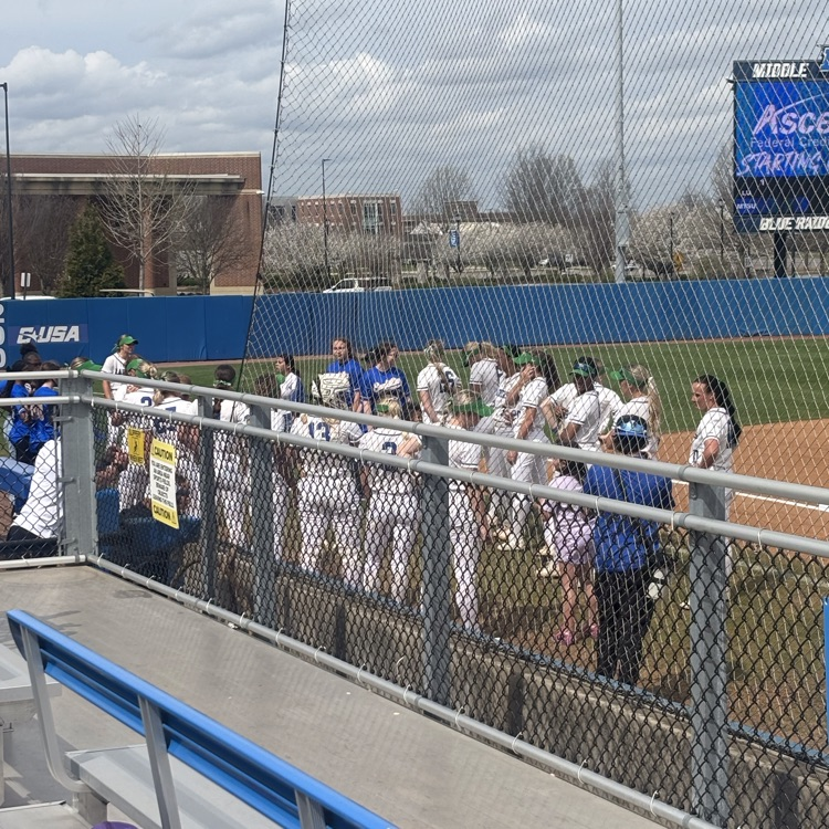 HMS Softball players enjoying the MTSU game