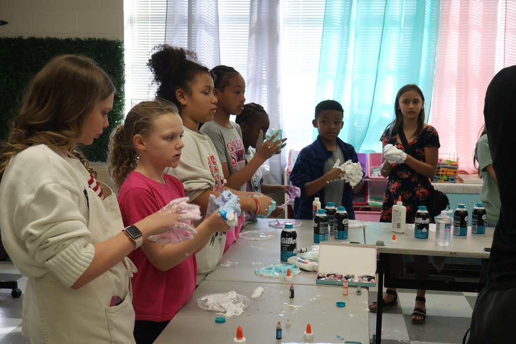 Students making slime during STEAM event. 