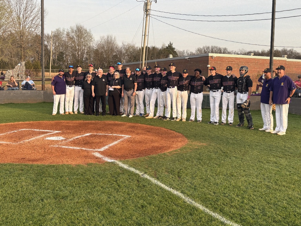 Group photo of the Community High School baseball team receiving a generous donation from Hardee's.