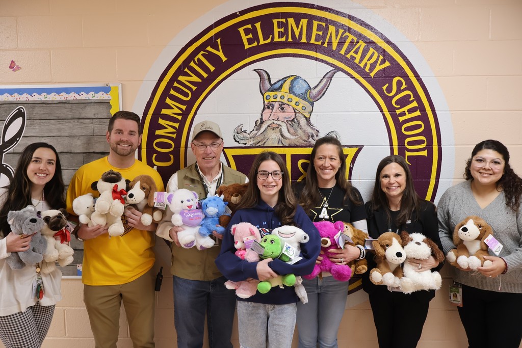 Group photo at Community Elementary School from Asher's Animals stuffed animal donation. 