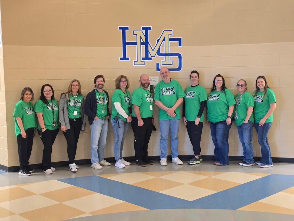 Group of staff members from Harris Middle School wearing their CC5K shirts.