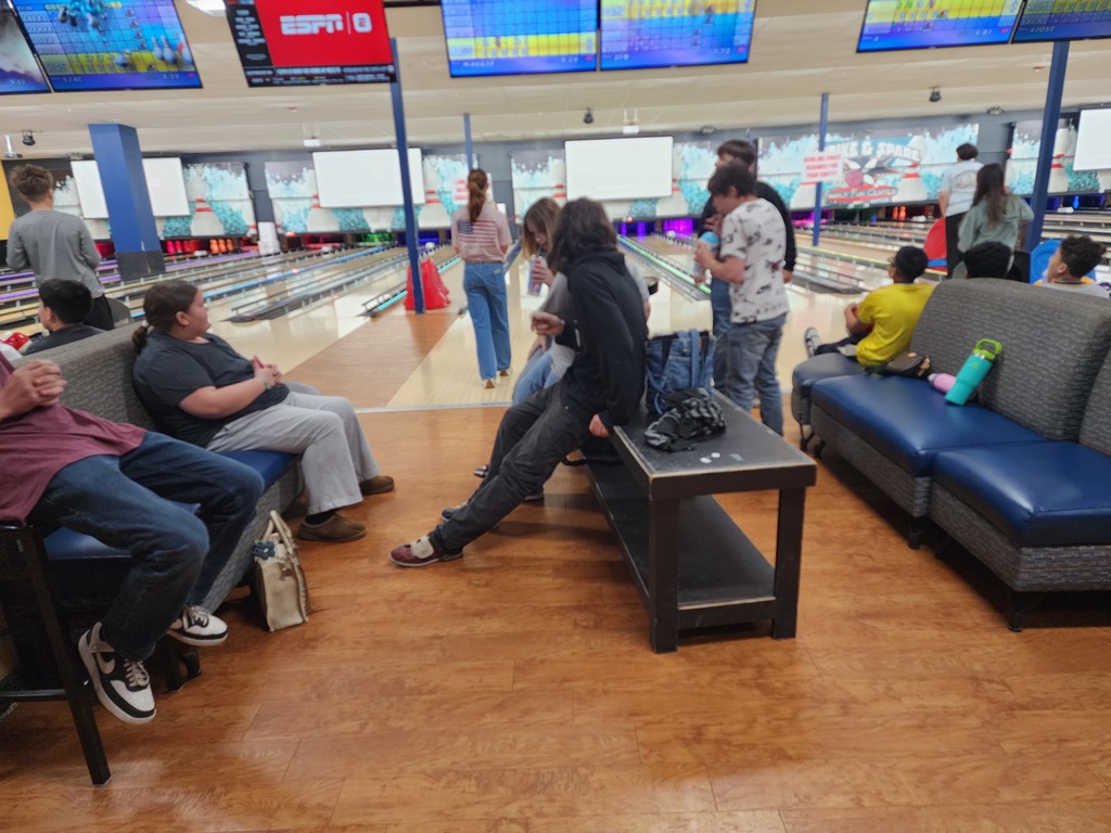kids sitting around 