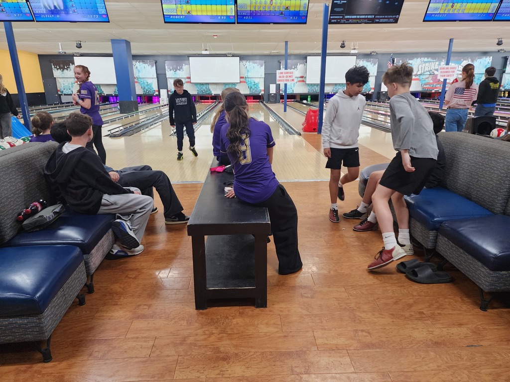 kids watching someone bowl