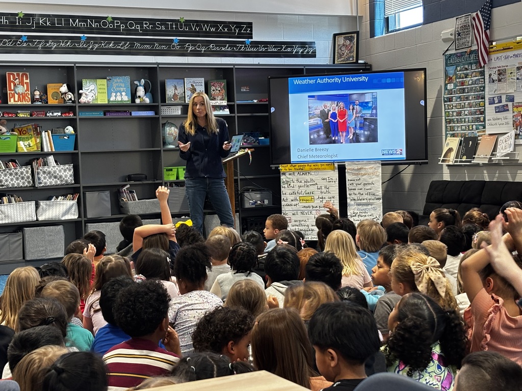 Danielle Breezy talking to students