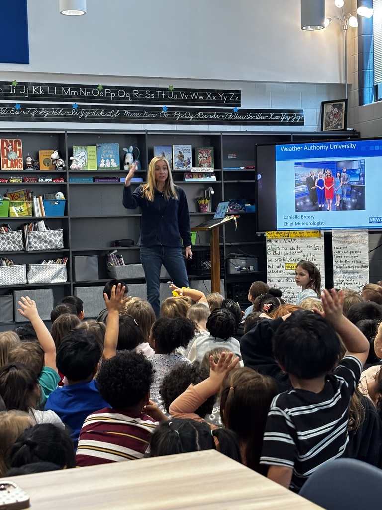 Danielle Breezy talking to students