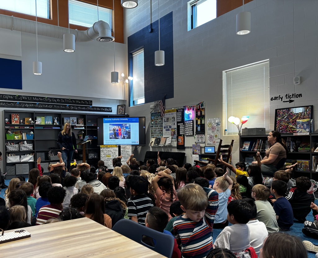 Danielle Breezy talking to students