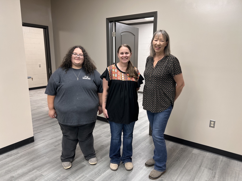 Group photo of the Bedford County Schools Maintenance Team in their new offices in TCAT