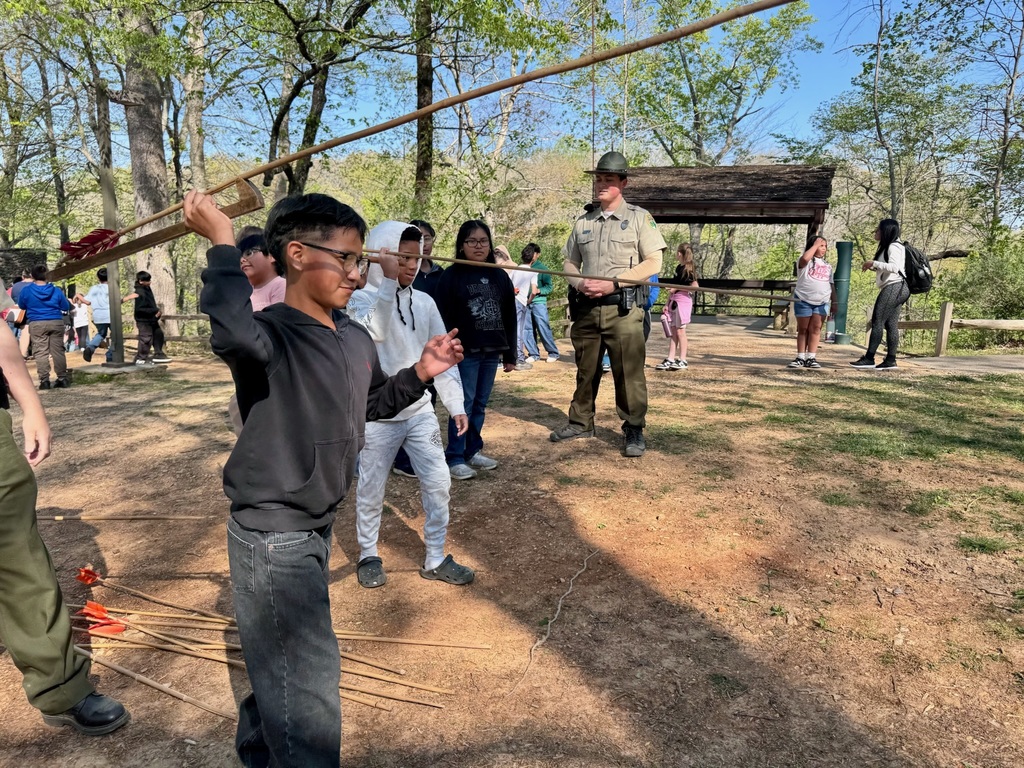 Students are learning about throwing spears.