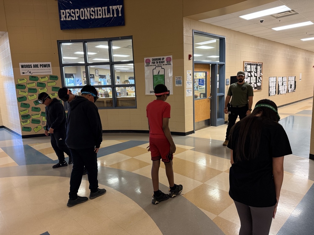 7th Grade Students finding out what it is like to take a field sobriety test.