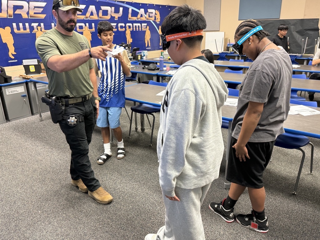 7th Grade Students finding out what it is like to take a field sobriety test.