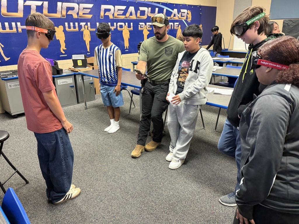 7th Grade Students finding out what it is like to take a field sobriety test.