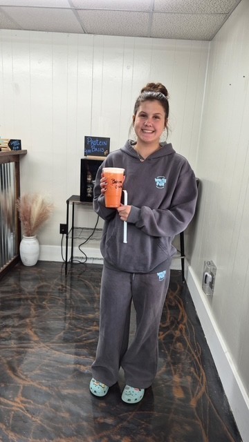 SCHS student is holding a drink in her hand from Celebration Nutrition