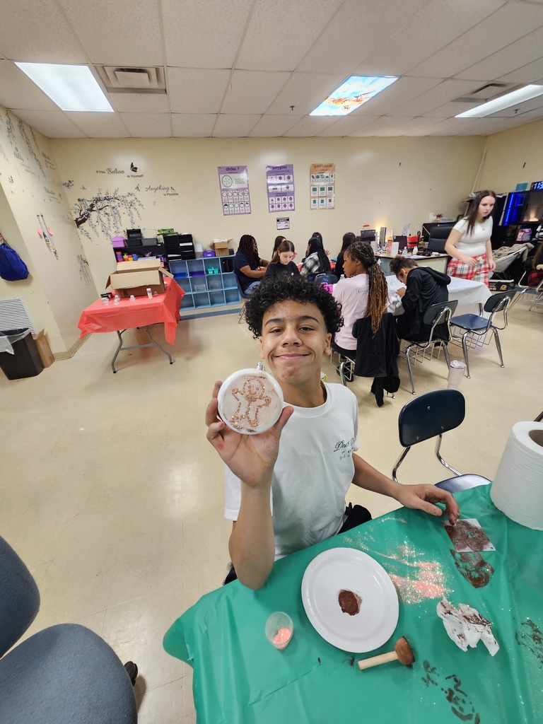 Students making Christmas ornaments at Christmas block party
