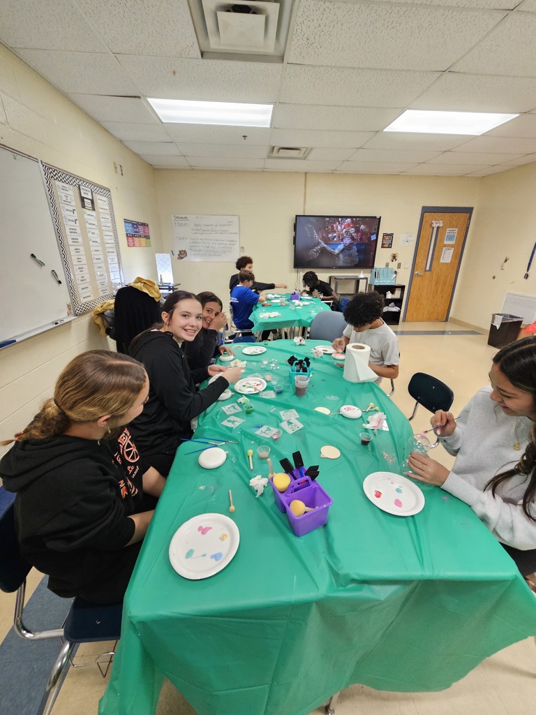 Students making Christmas ornaments at Christmas block party