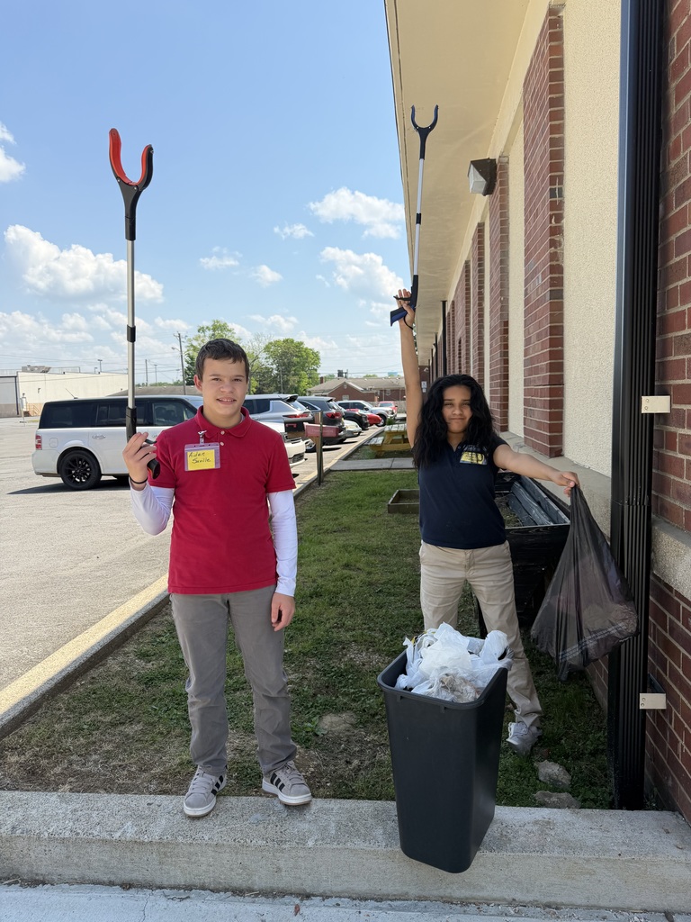 students cleaning up garbage