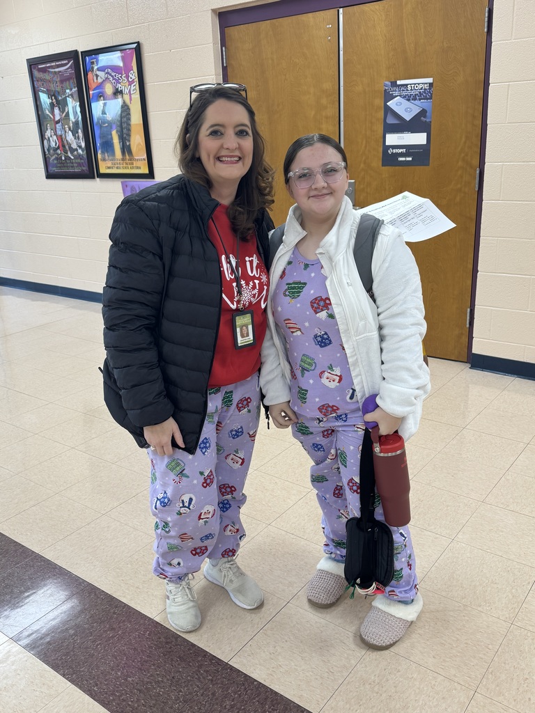 adult and student smiling