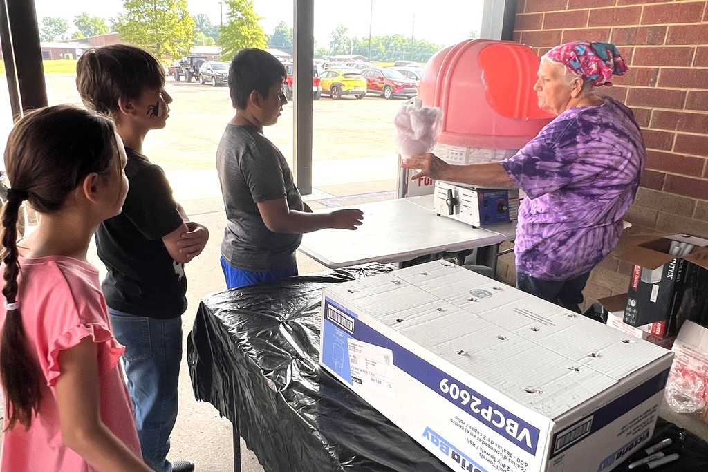 Students are in line for cotton candy.