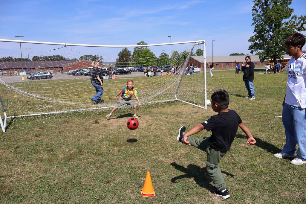 Students are playing soccer.