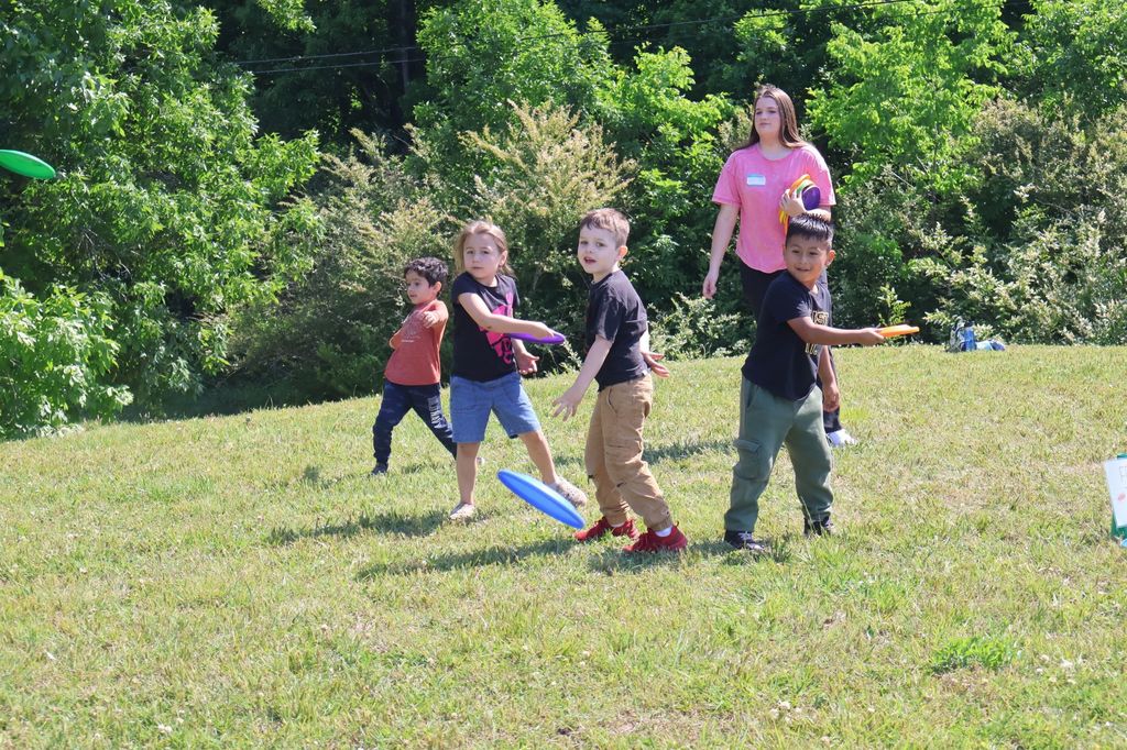 Students are throwing frisbees