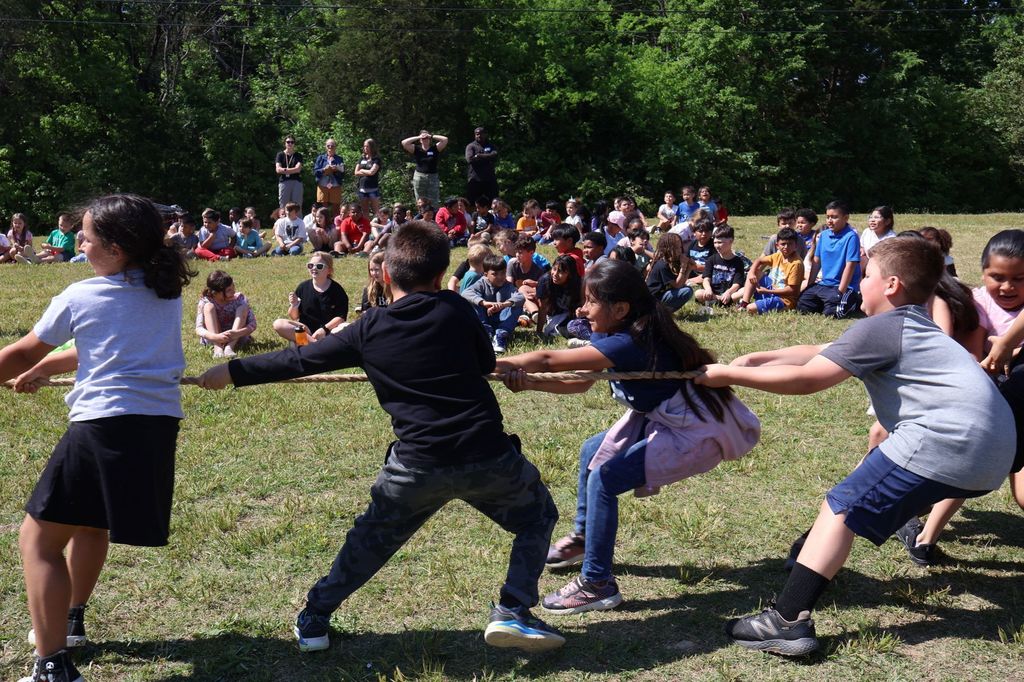 Students are playing tug of war.