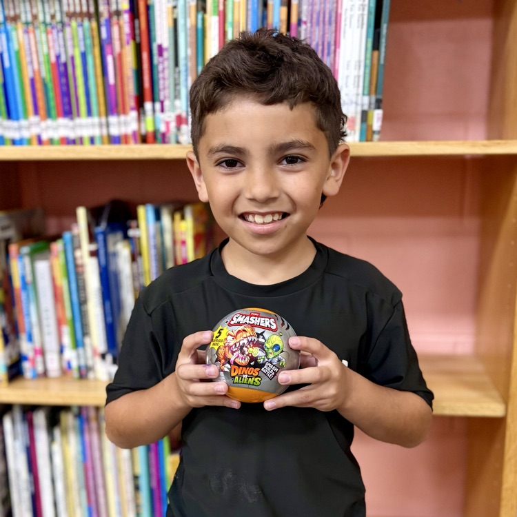 student with a toy
